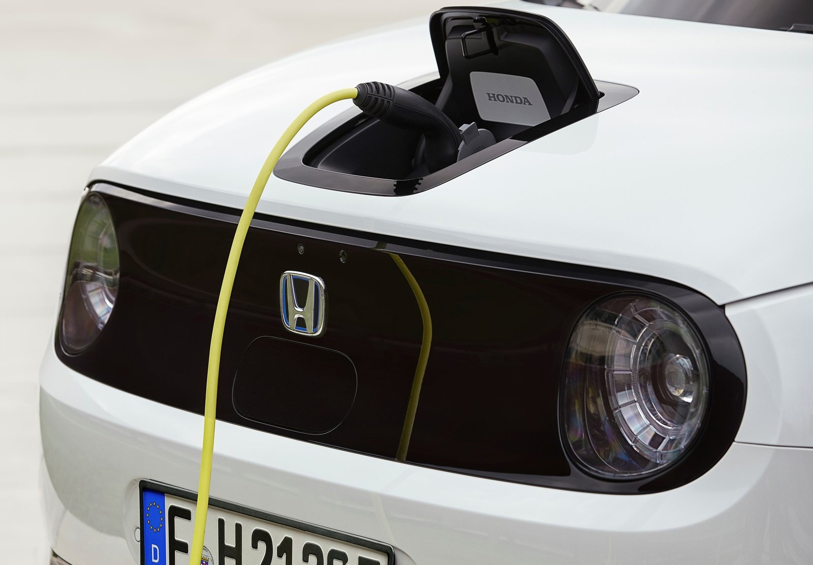 Honda e front and charging point