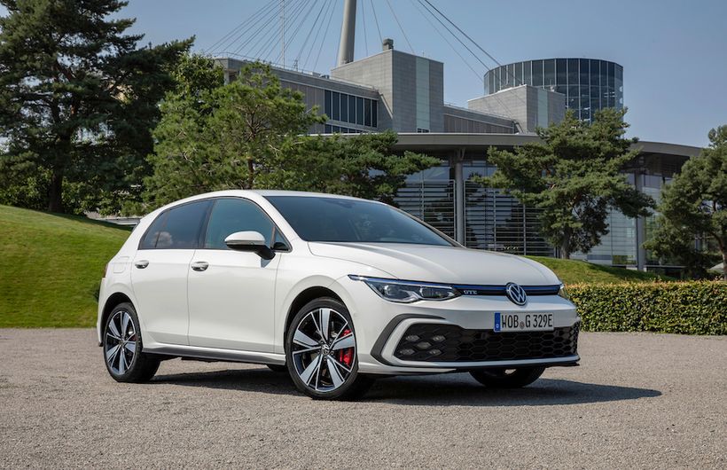 VW Golf GTE exterior front and side parked in front of building