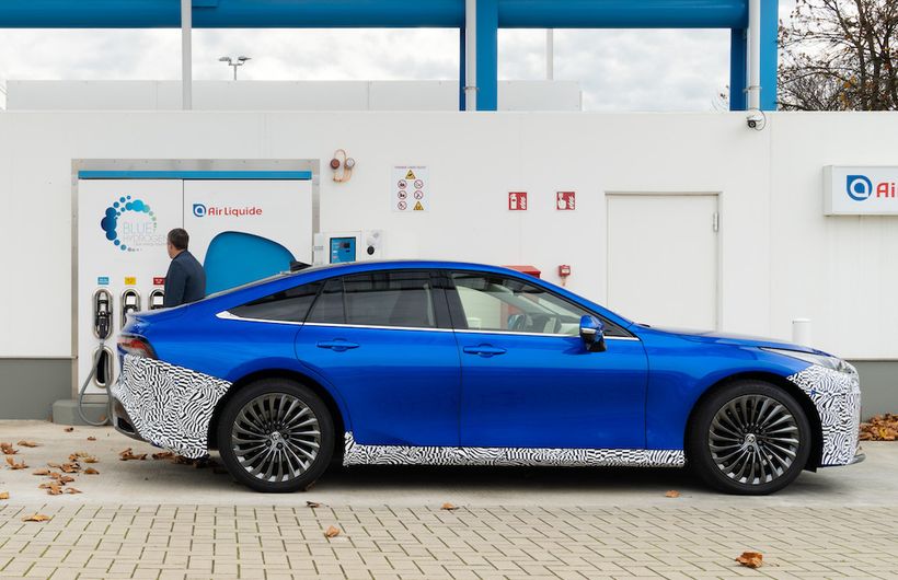 Toyota Mirai Hydrogen exterior side at hydrogen station