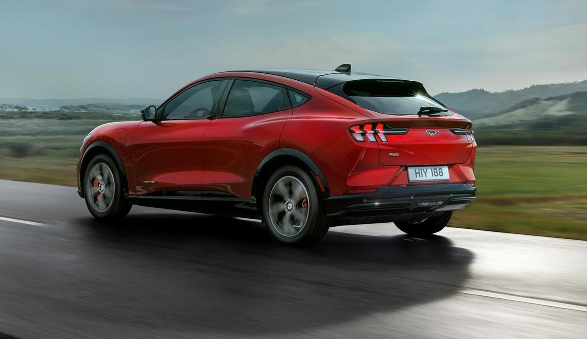 Ford Mustang mach e gt exterior side driving in country