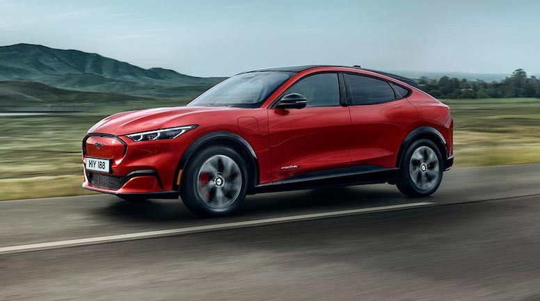 Ford Mustang mach e gt exterior side driving in country