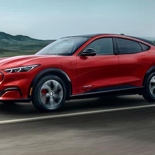 Ford Mustang mach e gt exterior side driving in country