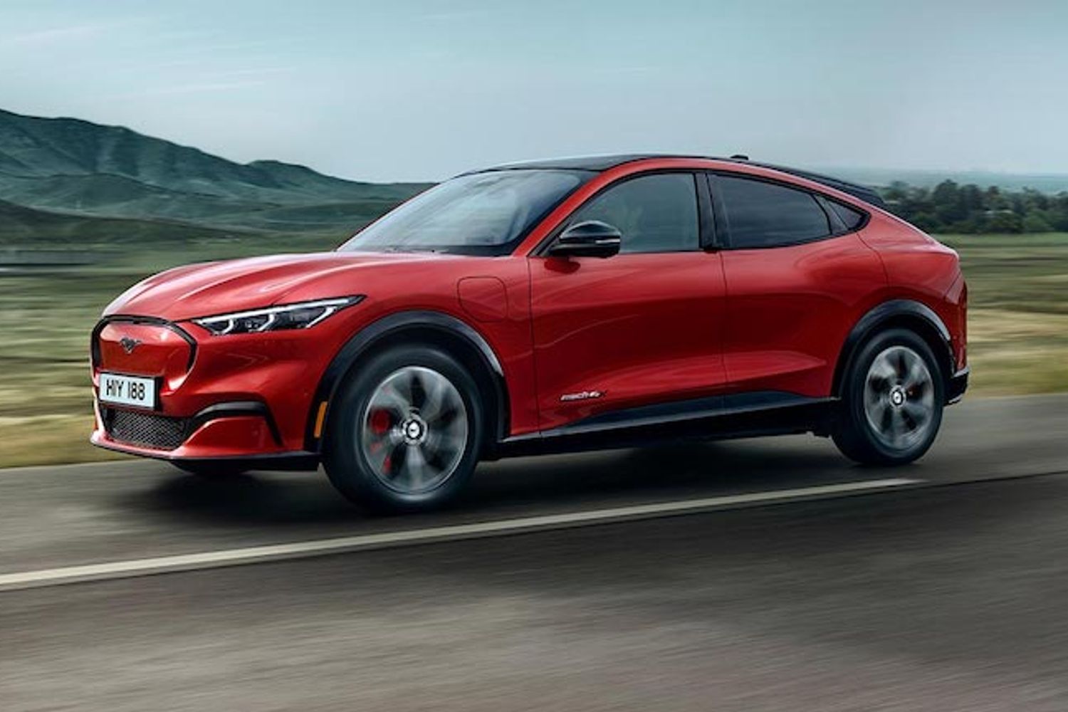 Ford Mustang mach e gt exterior side driving in country