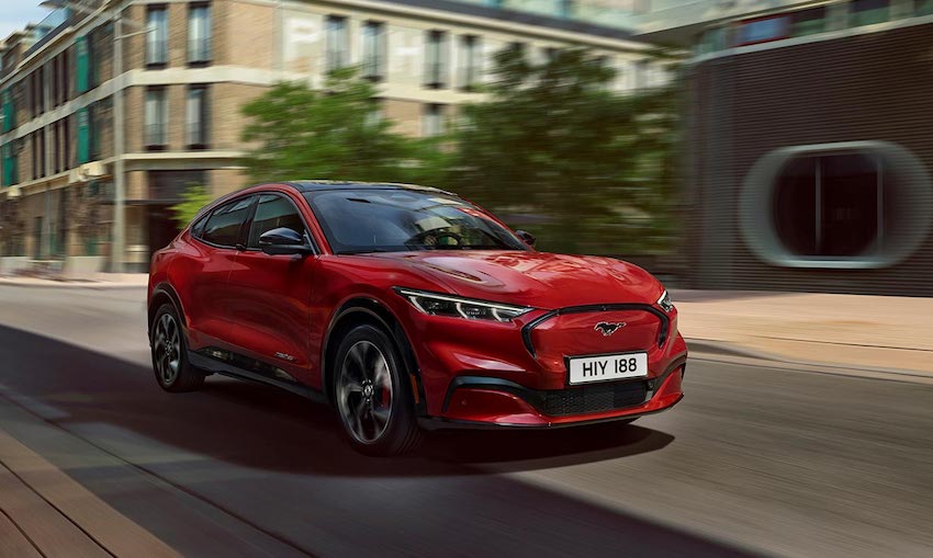 Ford Mustang mach e gt exterior front driving in city