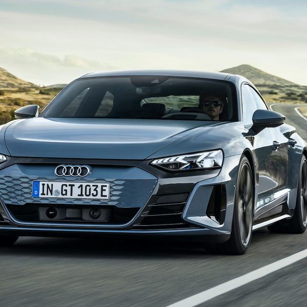 Audi e-tron GT electric car exterior front driving in conutryside