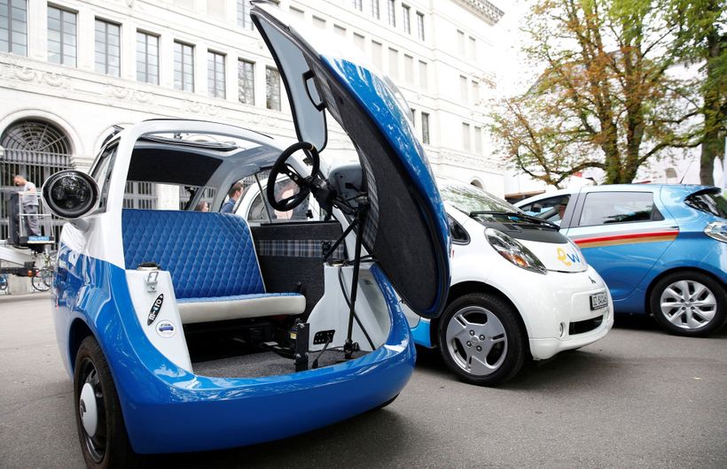 Microlino two seater bubble electric vehicle with door open