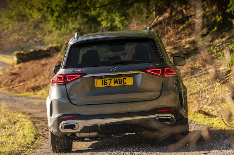 Mercedes-Benz GLE350de4MATIC rear action shot, UK registered, driving on dirt track