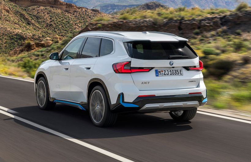 BMW iX1, German registered, action rear three quarters, white car