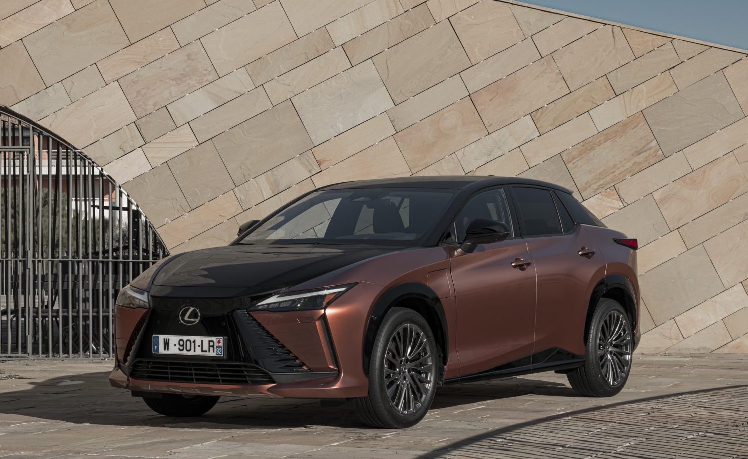 Lexus RZ 450e, front static, two tone copper/black, French registration